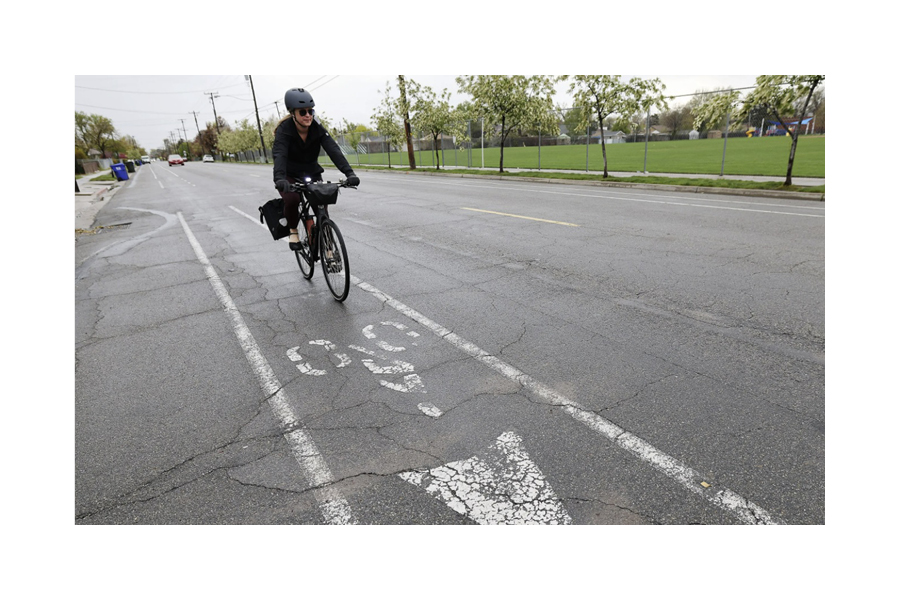 Bicyclist riding in bike land